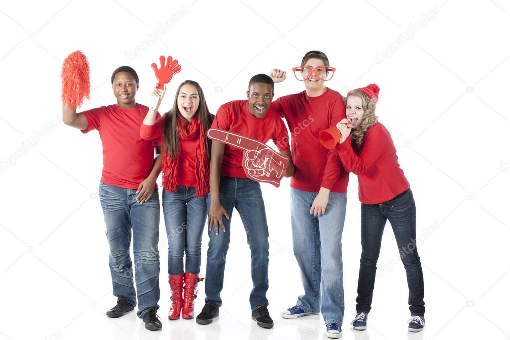 Sports Fans. Group of cheering teenagers standing together for the winning red team