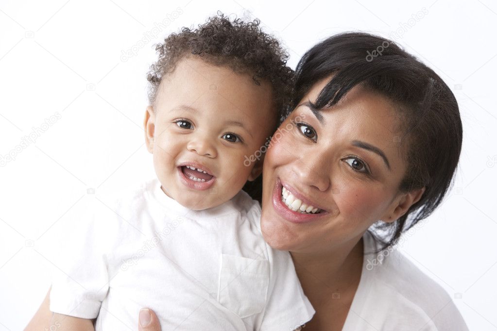 Black african american mother holding her toddler little boy