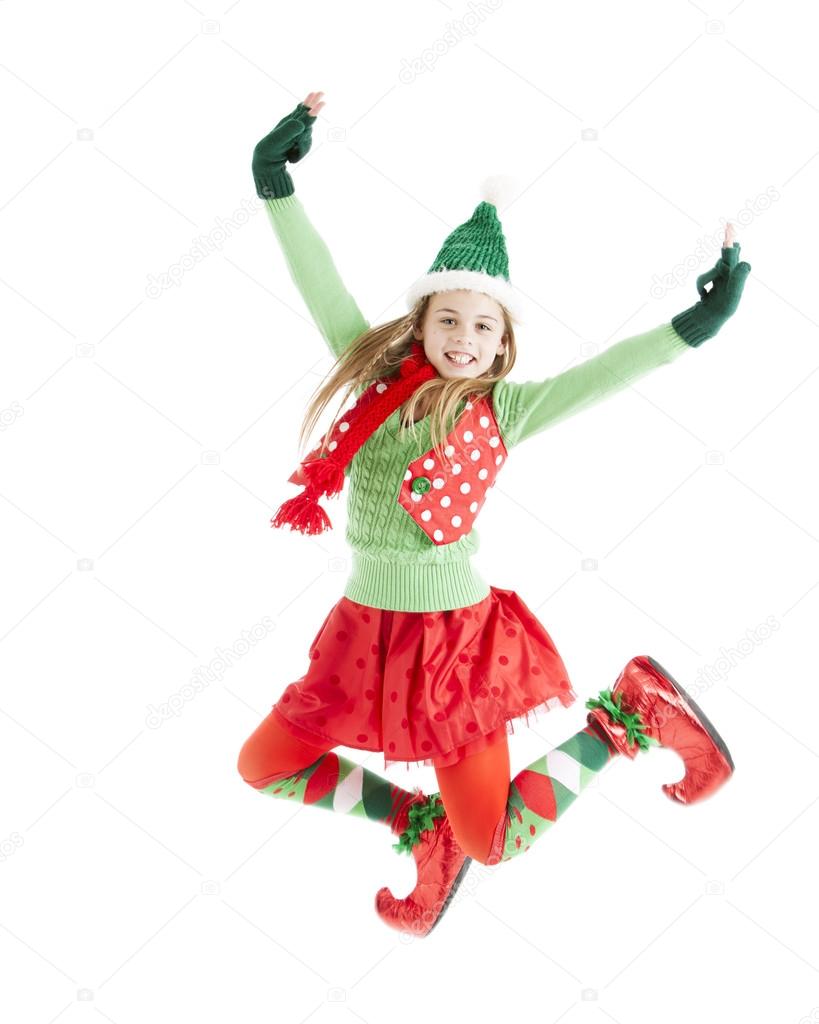 Christmas elf jumps in the air — Stock Photo © jbryson #21427513, image size:819x1024