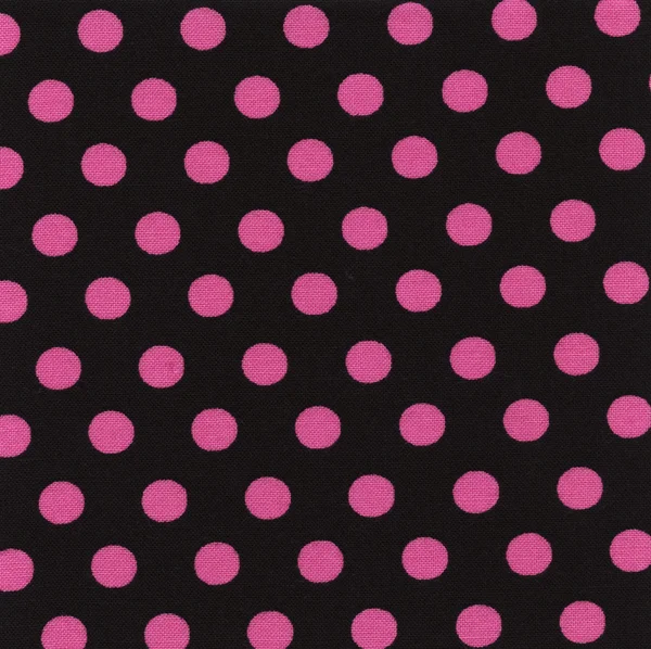 A high resolution black fabric with pink polka dots — Stock Photo, Image