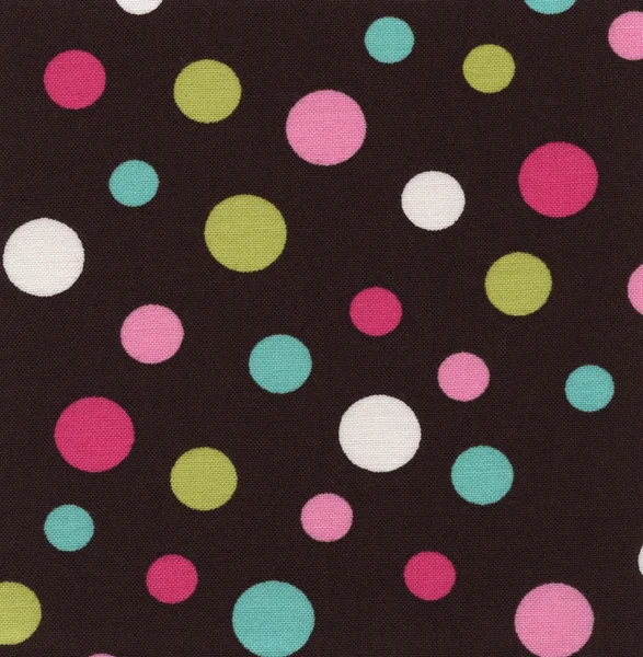 A high resolution brown fabric with multi-colored polka dots — Stock Photo, Image