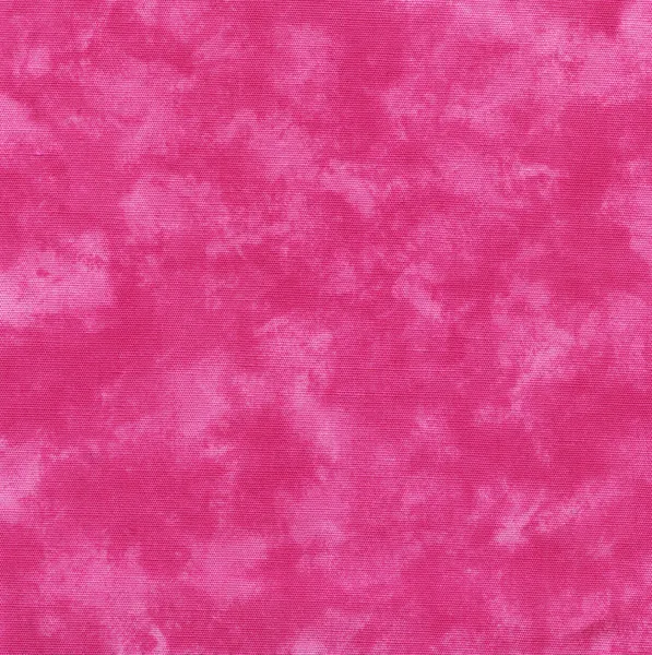 A high resolution bright pink fabric that looks like tie dye or paint — Stock Photo, Image