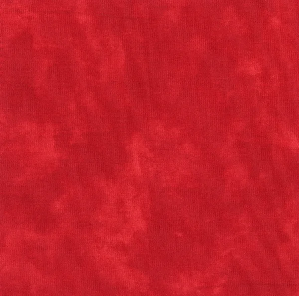 En hög upplösning ljusa röda varma tyg som ser ut som tie dye eller måla. — Stockfoto