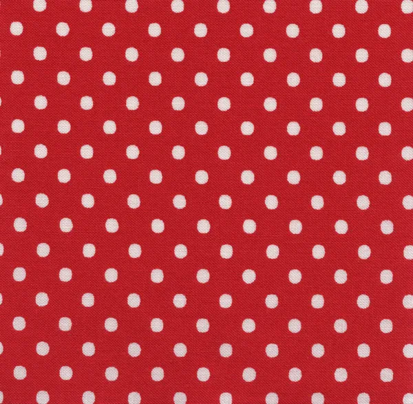 En hög upplösning ljust rött tyg med vita prickar — Stockfoto