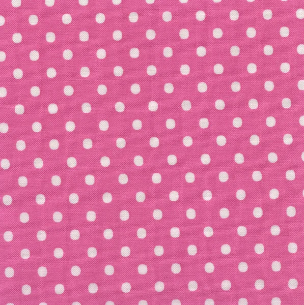 Een weefsel van de hoge resolutie roze met witte polka-dots Stockfoto