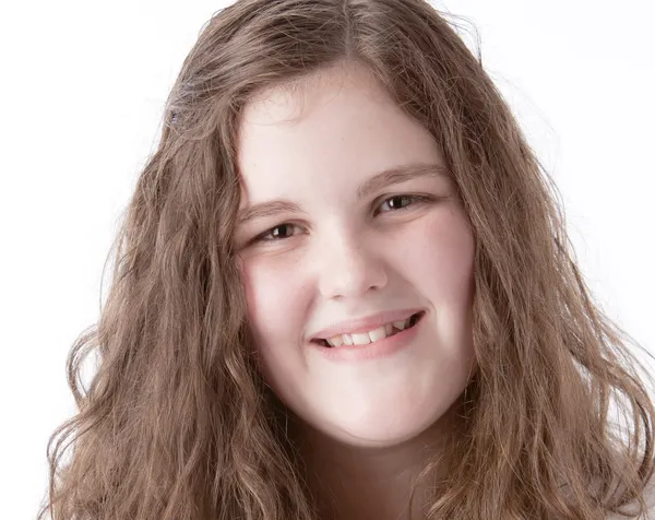 A closeup headshot of a 14 year old caucasian smiling real teenage girl — Stock Photo, Image