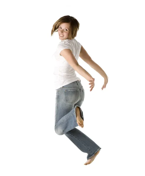Hezká žena skáče radostí — Stock fotografie