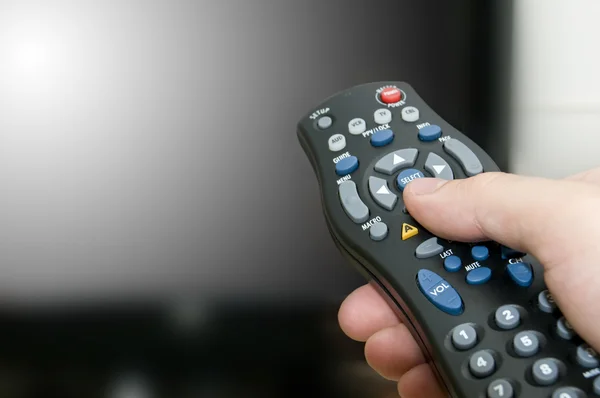 Remote control and tv — Stock Photo, Image