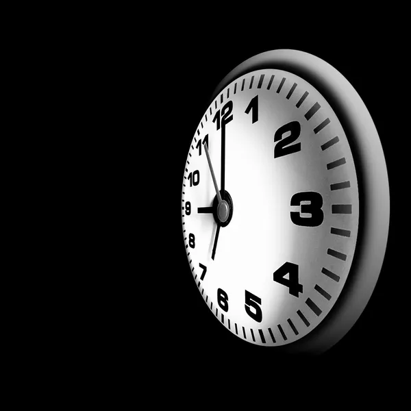 Часы на черном фоне — стоковое фото