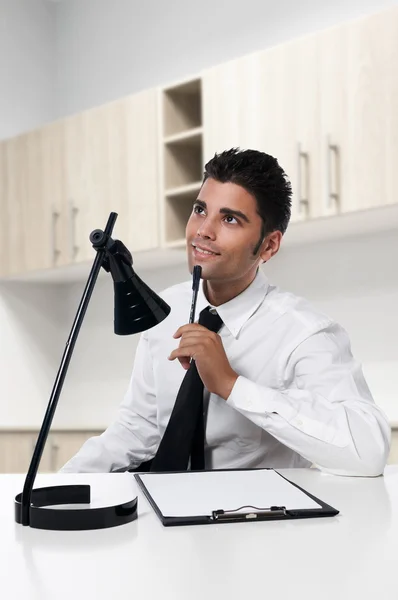 Young successful business man at office — Stock Photo, Image