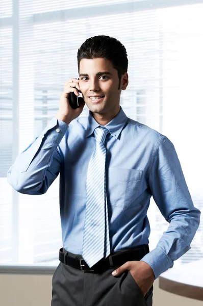 Young successful business man at office — Stock Photo, Image