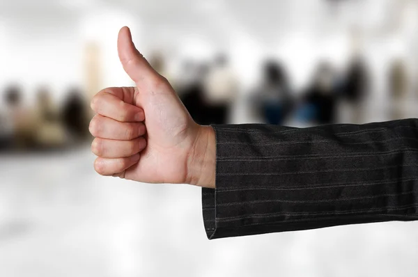 Business concept: thumb up sign at office — Stock Photo, Image