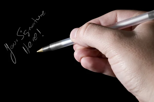 Geïsoleerde hand en pen met kopie ruimte — Stockfoto