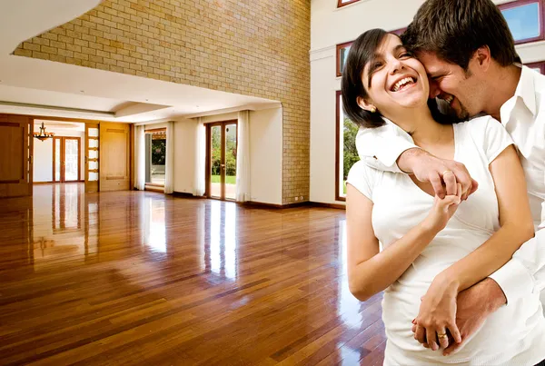 Young happly couple at their new house — Stock Photo, Image