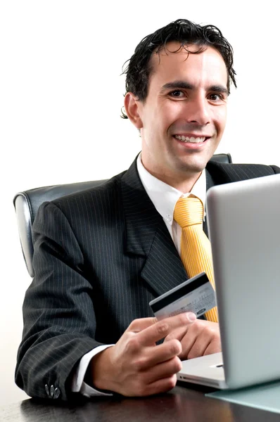 Business man at office paying online with his credit card — Stock Photo, Image