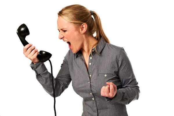 Business woman yelling at phone — Stok fotoğraf