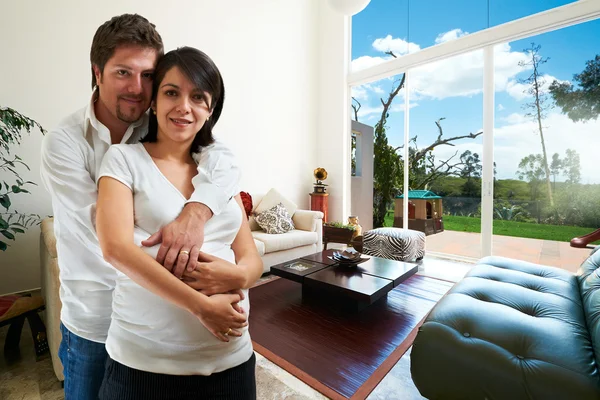 Young happy couple at their new house — Stock Photo, Image