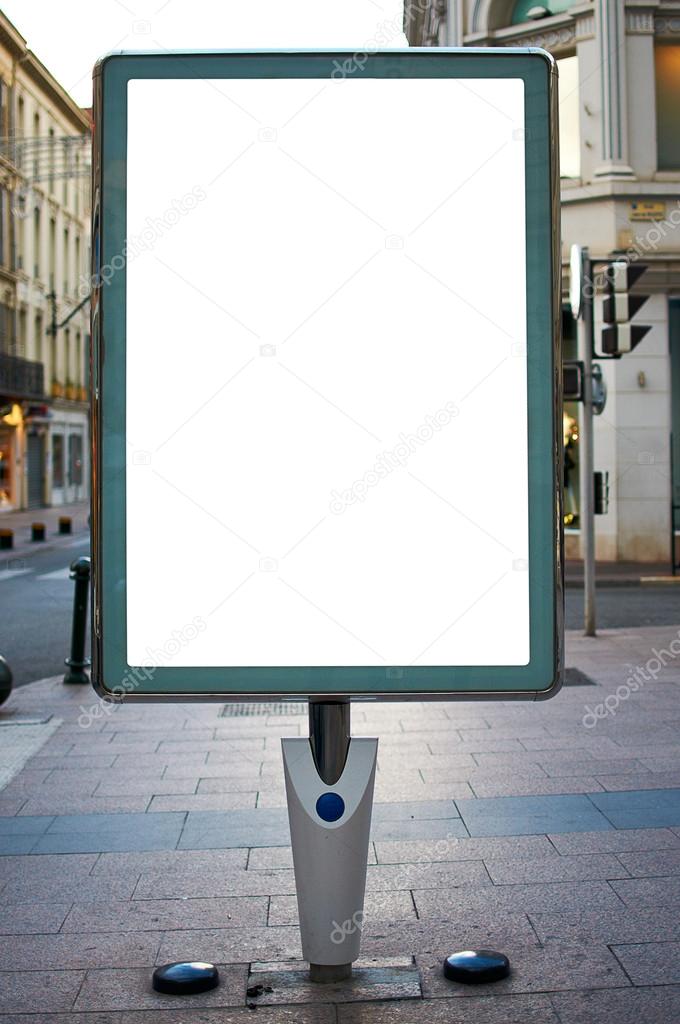 Empty white billboard on the sidewalk