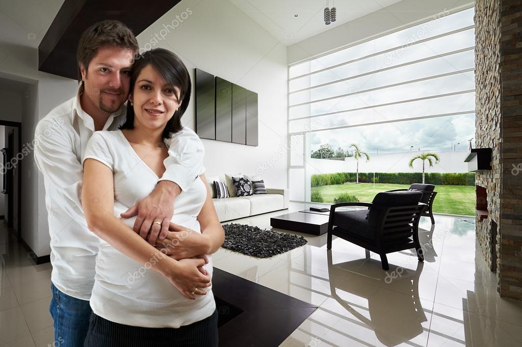 Young happy couple at their new house