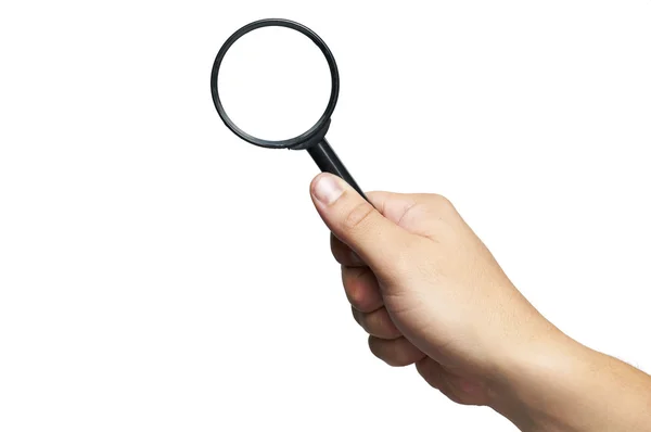 Hand holding magnifying glass — Stock Photo, Image