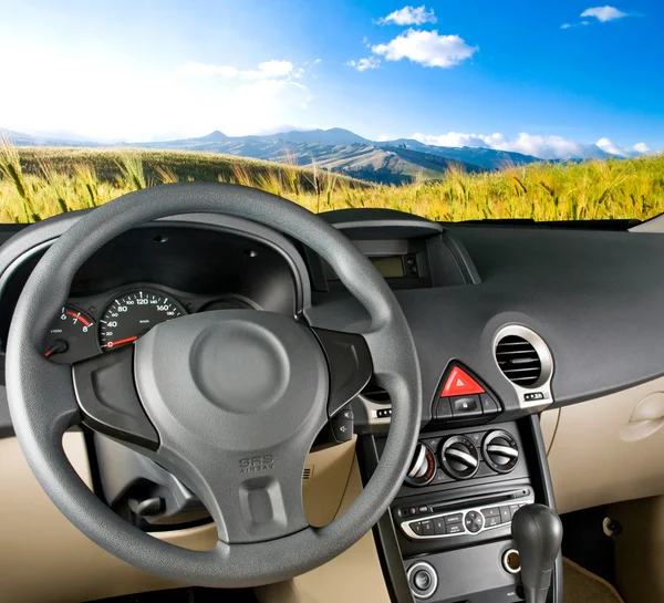 Car interior. Landscape view — Stock Photo, Image