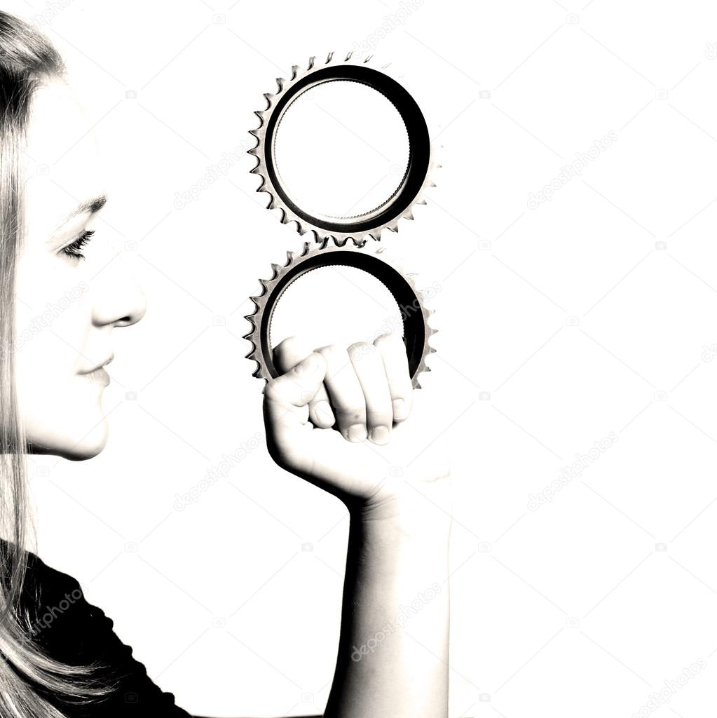 girl holding gears business concept
