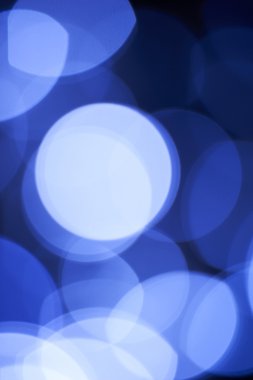 Mavi Noel ışıkları ile siyah bac üzerinde yapılan gerçek bokeh etkisi