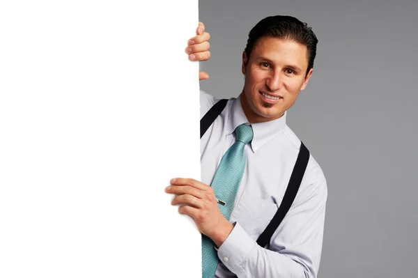 Business man holding white banner — Stock Photo, Image