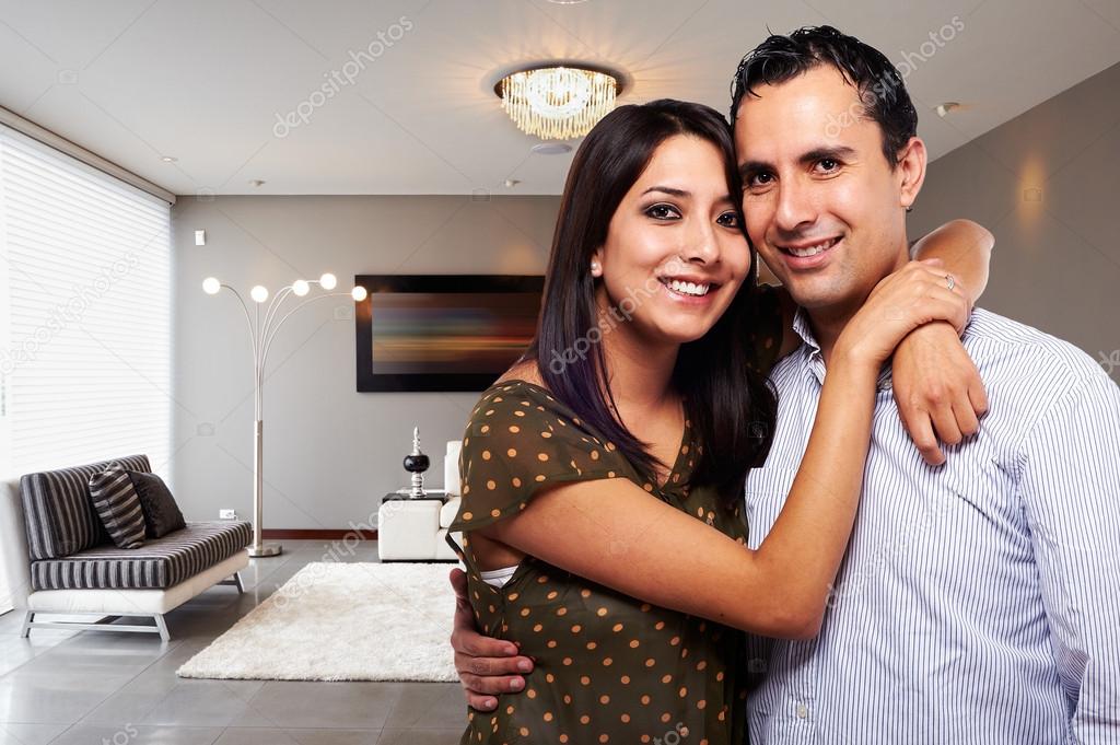 Young happy couple at their new modern house
