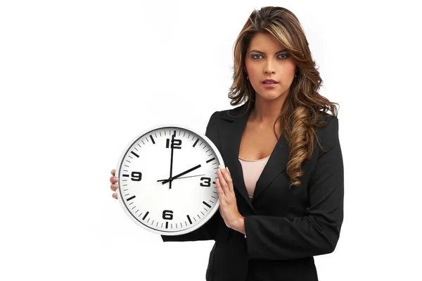 Mujer de negocios sosteniendo reloj. Aislado sobre blanco — Foto de Stock