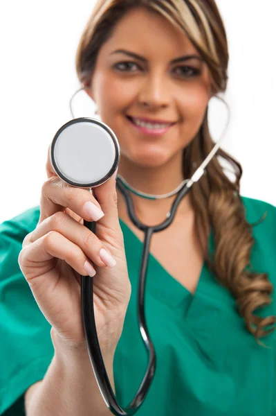 Smiling medical woman doctor with stethoscope. Isolated over whi Royalty Free Stock Images