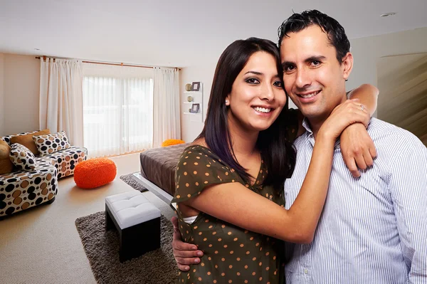 Young happy couple at bedroom — Stock Photo, Image