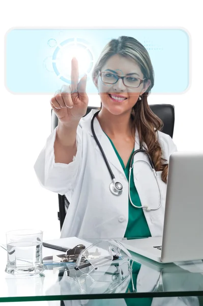 Unga kvinnliga kirurgen röra digital skärm — Stockfoto
