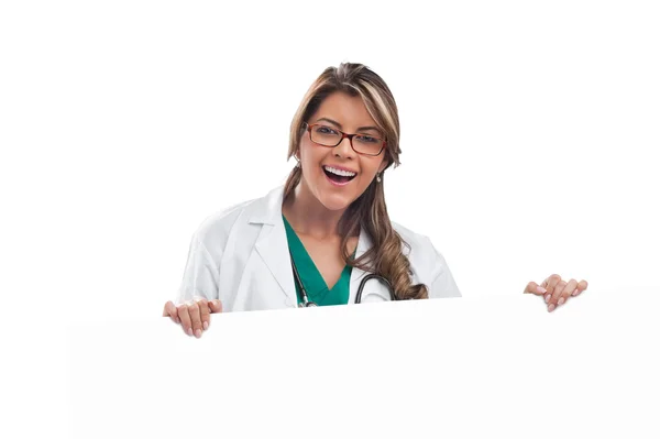 Woman doctor holding white empty banner. — Stock Photo, Image