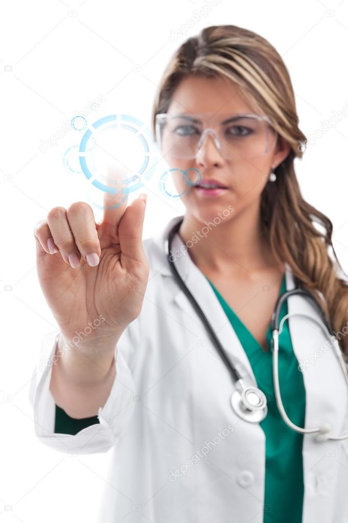 Young female surgeon touching digital screen. Isolated on white