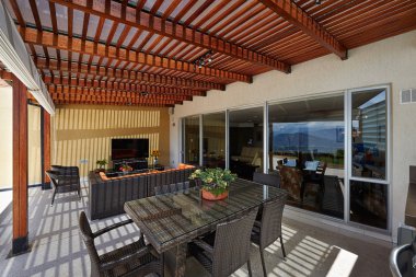 Interior design: Beautiful modern terrace lounge with pergola clipart