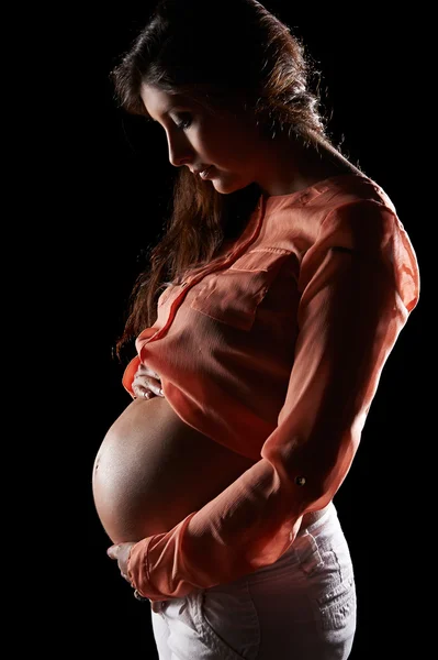 Junge schwangere Frau — Stockfoto