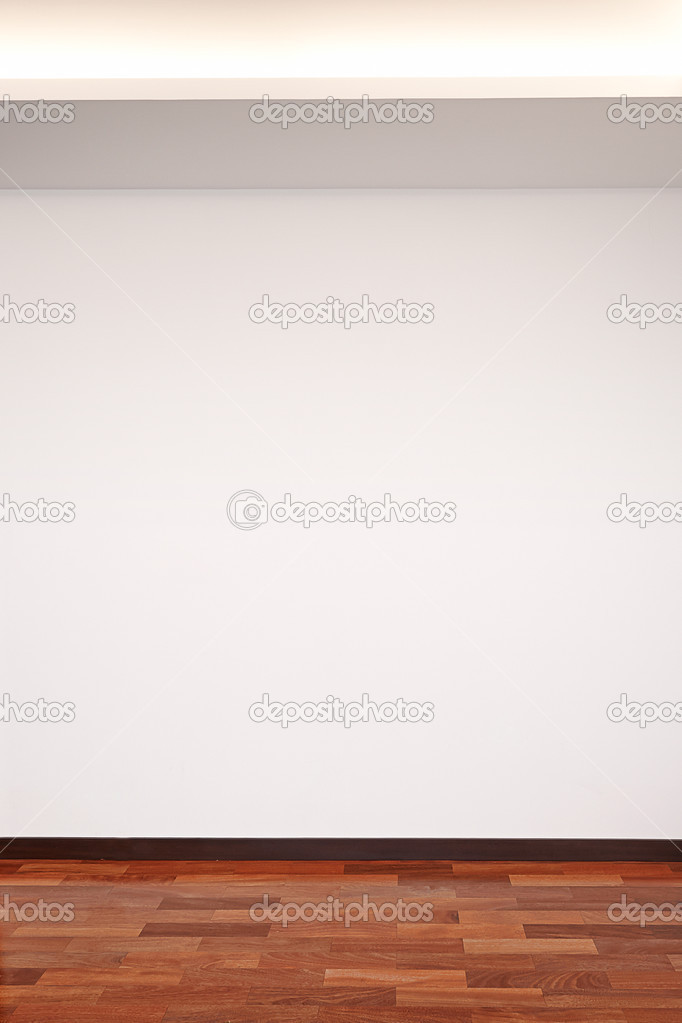 Empty white wall with light and wooden floor