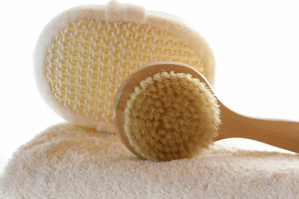 Towel with body brush — Stock Photo, Image