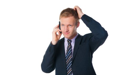yakışıklı işadamı cep telefonuyla konuşuyor