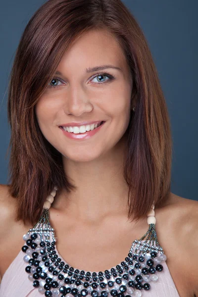Portrait of smiling brunette girl — Stock Photo, Image