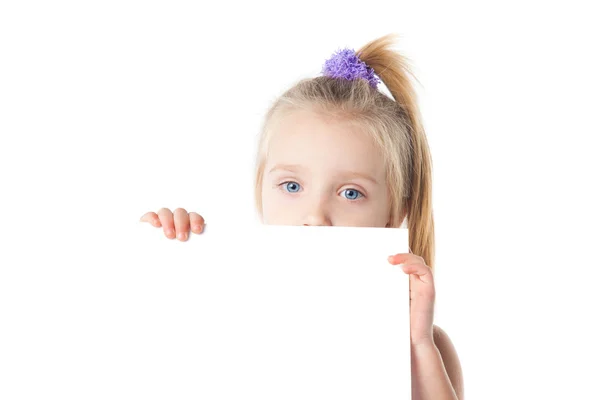 Little girl looking over empty board — Stock Photo, Image