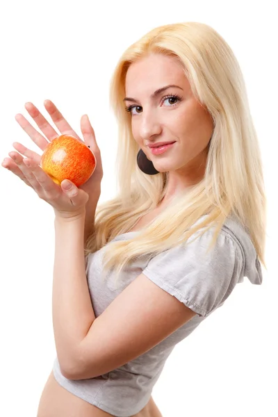 Beautiful blonde girl with red apple — Stock Photo, Image