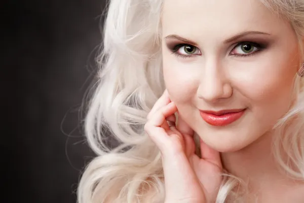 Studio shot of a young, beautiful, blonde woman — Stock Photo, Image