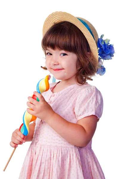 Pequena menina sorridente com pirulito — Fotografia de Stock