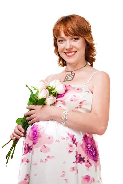 Pregnant woman wearing evening dress with bouquet of white roses — Stock Photo, Image