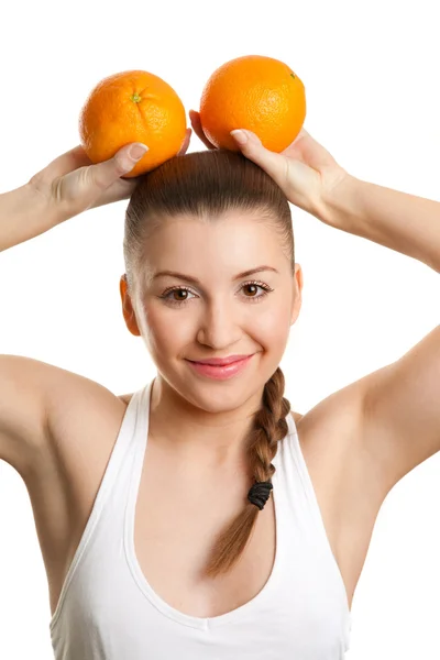 Beautiful girl with two juicy oranges — Stock Photo, Image