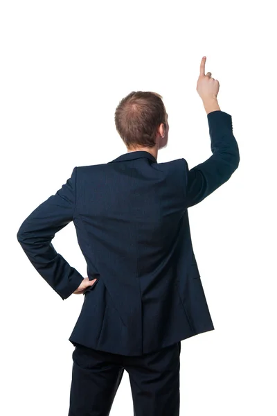 Businessman points finger up — Stock Photo, Image