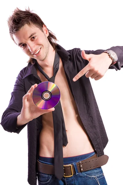 Lächelnder Junge zeigt auf die CD — Stockfoto