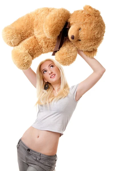 Girl with Teddy bear over her head — Stock Photo, Image